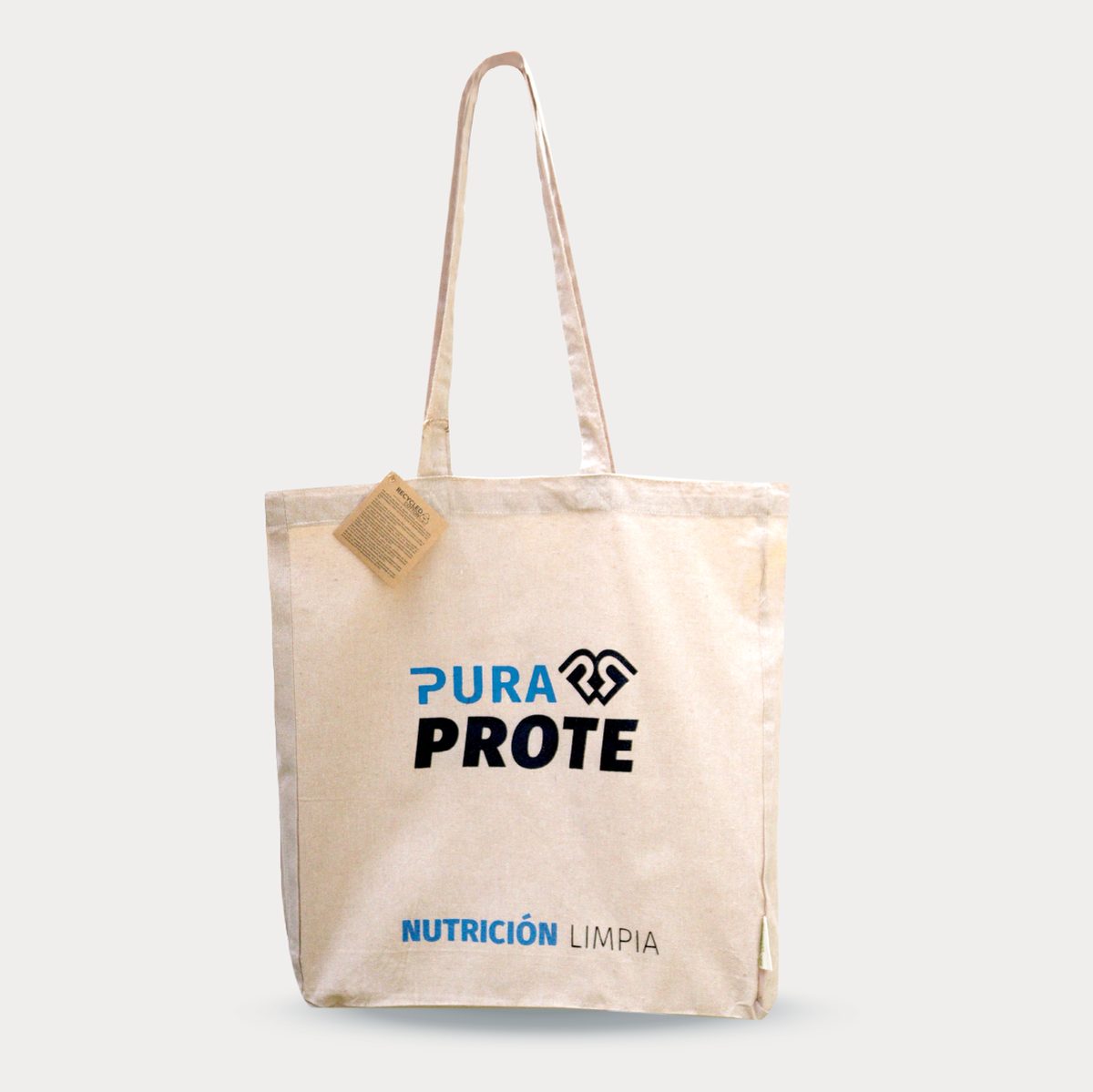 imagen vista fronta del tote bag pura prote con logo y frase nutricion limpia
