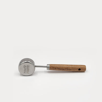 foto lateral del scoop pura prote 15 ml, hecho de puño de madera y acero inoxidable