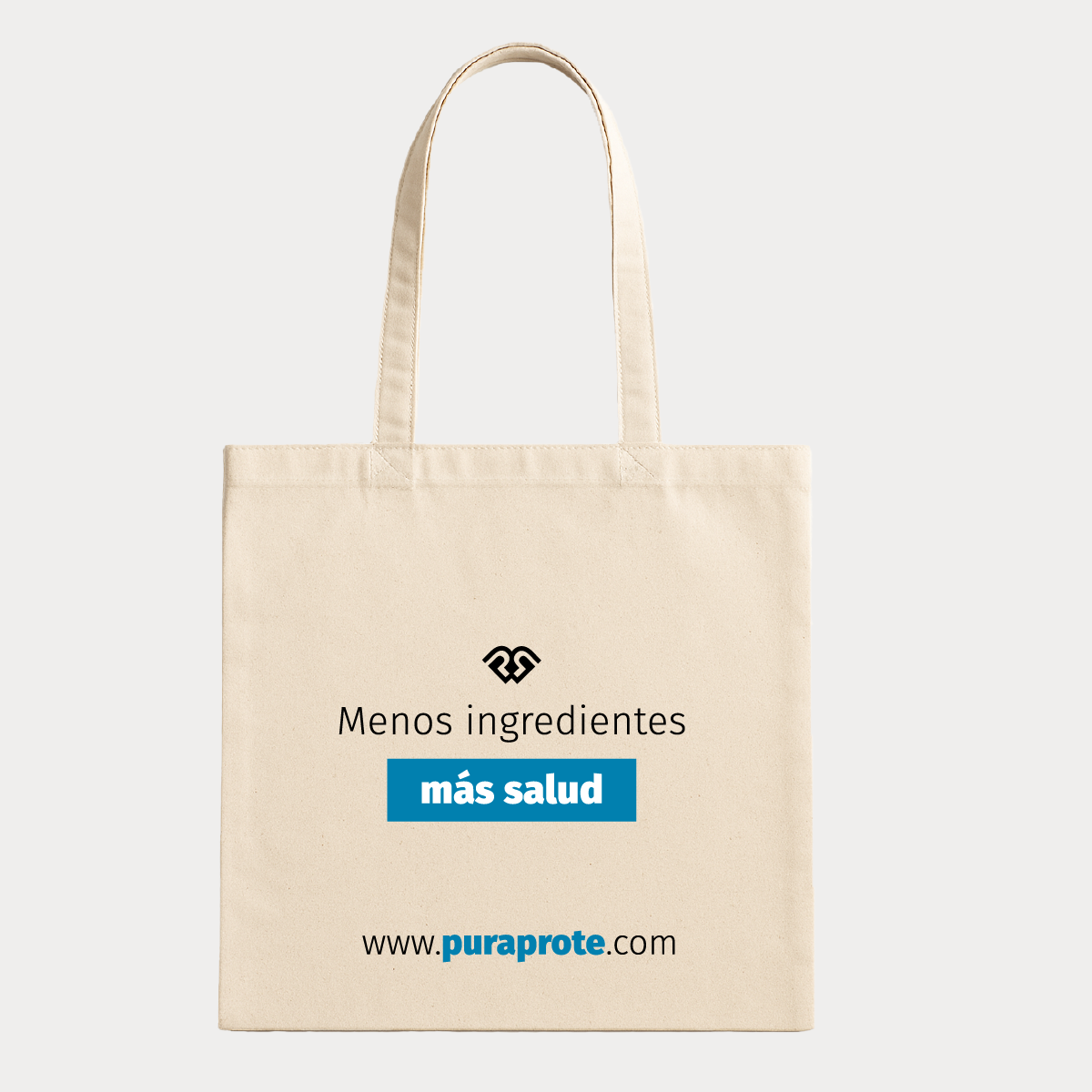 vista del dorso del tote bag pura prote que dice Menos ingredientes más salud